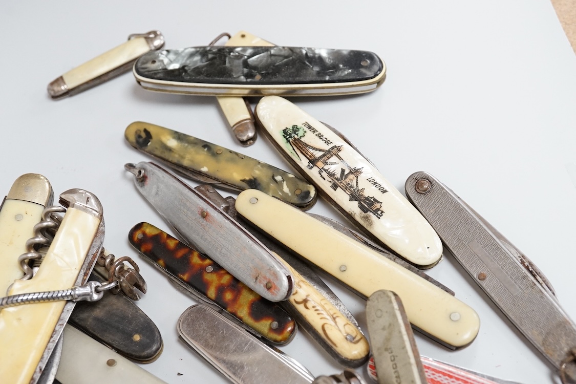 A collection of assorted penknives and whistles